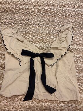Amazon Cream Ruffle Camisole with Black Bow
